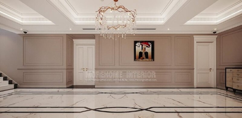 Trang trí hành lang đẹp ấn tượng với họa tiết độc đáo từ sàn lát đá cùng đường chỉ tường ấn tượng, bức tranh điểm nhấn kết hợp với nét tinh tế từ đèn trần cao cấp. Mẫu thiết kế nội thất chung cư đẹp
