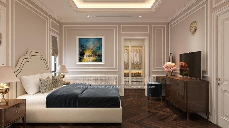 Trang trí nội thất phòng ngủ tân cổ điển nhẹ nhàng, sang trọng với giường bọc nệm trắng, kệ tivi gỗ óc chó cao cấp. Mẫu nội thất biệt thự đẹp